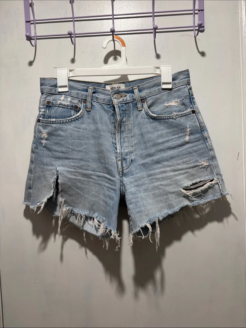 AGOLDE Parker distressed long denim shorts